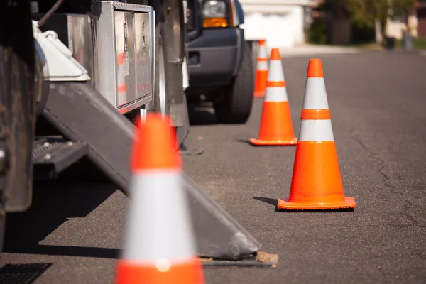 Several Orange Hazard Cones and Utility Truck in Street. — Stock Photo, Image