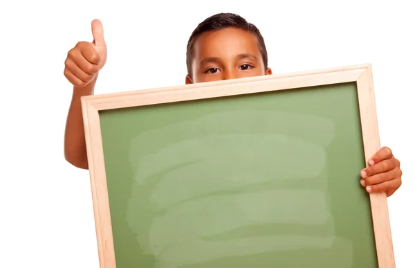 Roztomilý hispánské chlapec s prázdnou tabuli a palce izolovaných na prostřené — Stock fotografie