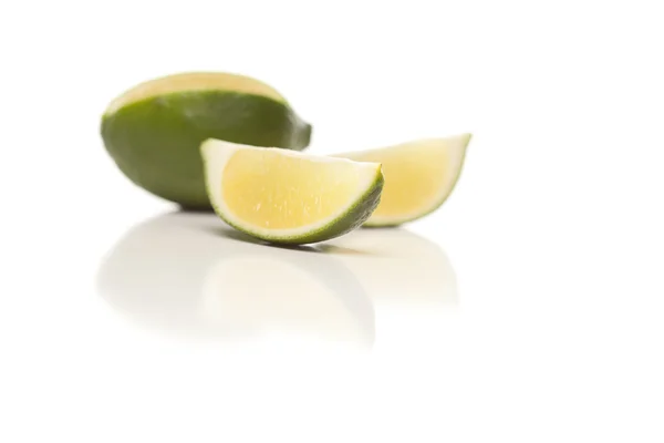 Sliced Lime on a Reflective White Surface. — Stock Photo, Image