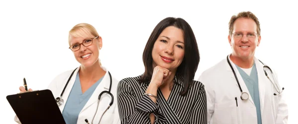Hispanic Woman with Male Doctor and Nurse — Stock Photo, Image