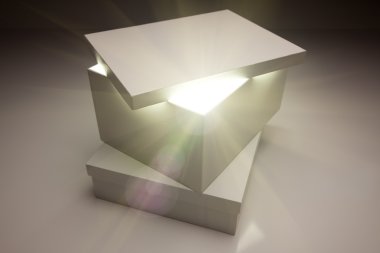White Box with Lid Revealing Something Very Bright clipart