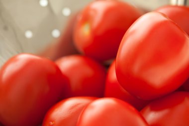 Fresh, Vibrant Roma Tomatoes clipart