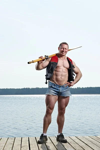 Man with oar — Stock Photo, Image
