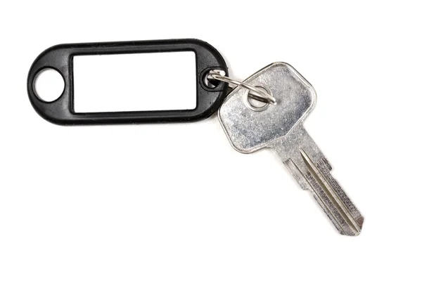 Etiqueta em branco e chave — Fotografia de Stock