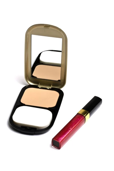 Powder compact and Lip gloss — Stock Photo, Image