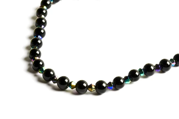 Beautiful black string of beads — Stock Photo, Image
