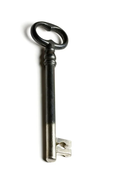 Uma chave velha isolada no branco — Fotografia de Stock