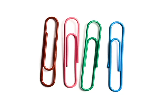 Quatro clipes multicoloridos — Fotografia de Stock