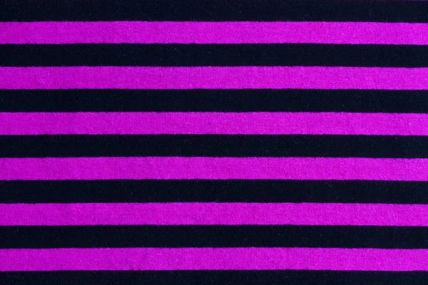 Текстура из розовой и черной полосатой ткани — стоковое фото