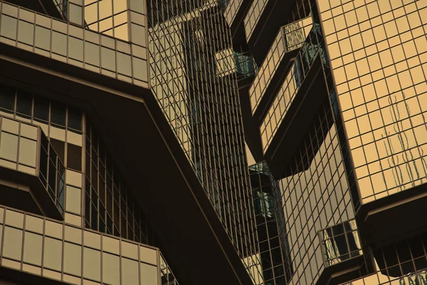 Wolkenkrabber windows achtergrond in hong kong — Stockfoto
