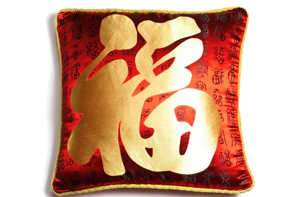 Rode kussen met chinese karakters — Stockfoto
