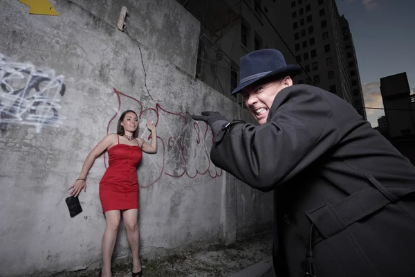 Man about to attack a woman — Stock Photo, Image
