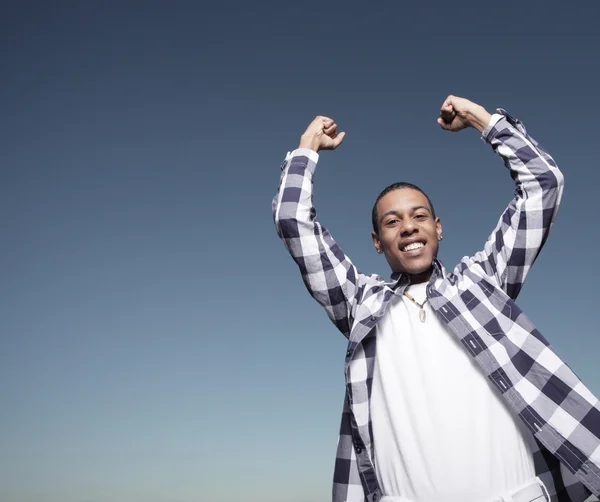 Young teen with arms outstretched — Stock Photo, Image