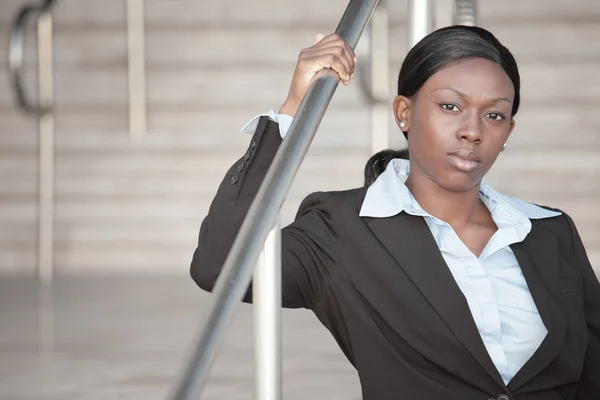 Businesswoman on a staircase — Stock Photo, Image
