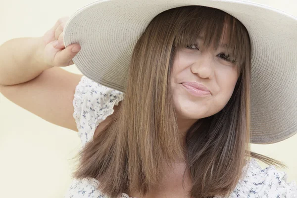 Woman smiling with a hat — Stock Photo, Image