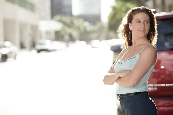 Image of a woman by the street — Stock Photo, Image