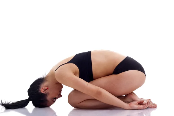 Joven yoga femenino — Foto de Stock