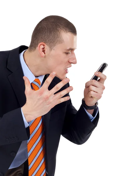 Homem gritando em seu telefone — Fotografia de Stock