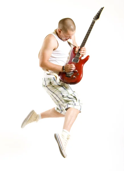 Guitarrista salta no ar — Fotografia de Stock