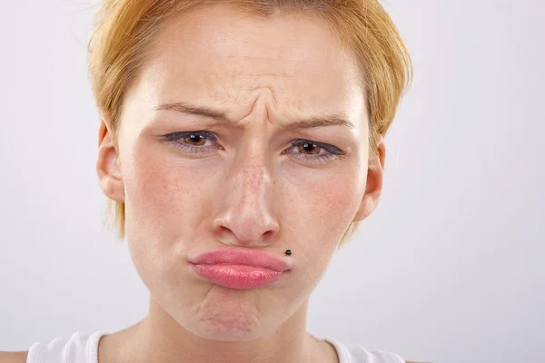 Woman pulling a face — Stock Photo, Image