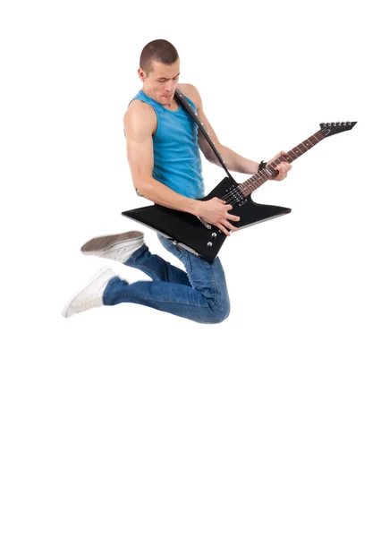 Guitarrista apaixonado salta — Fotografia de Stock