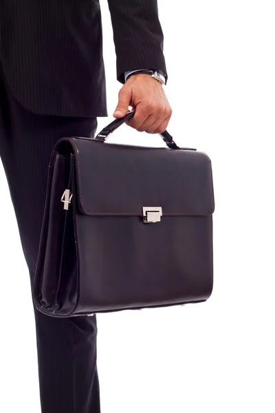 Homem de negócios segurando uma mala — Fotografia de Stock