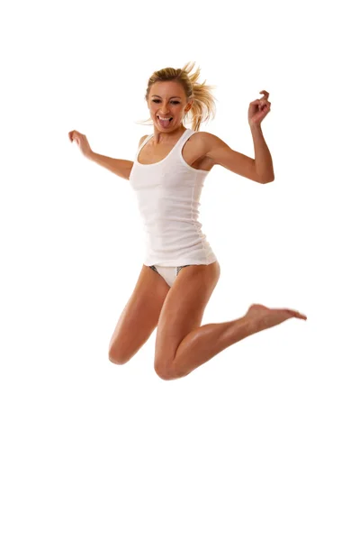 Mulher de lingerie saltando — Fotografia de Stock