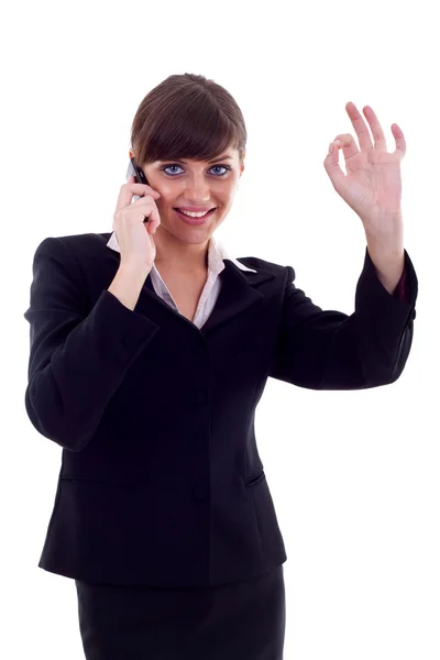Žena s telefonem a ok gesto — Stock fotografie