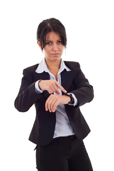 Mulher apontando seu relógio — Fotografia de Stock