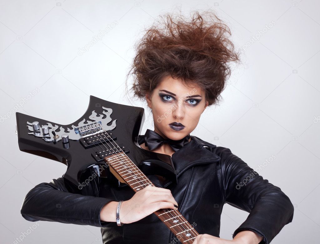 Attractive woman guitarist