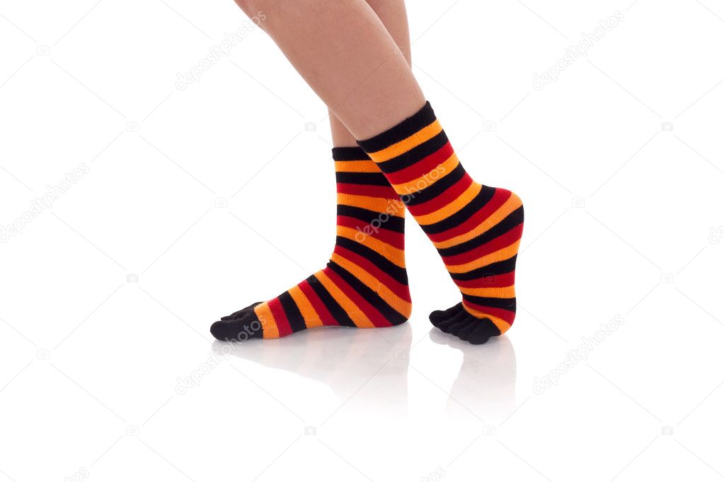 Woman legs in strip socks