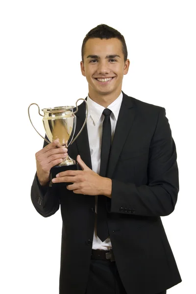 Muž držící trofej — Stock fotografie