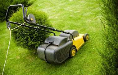 Lawnmower on the grass clipart