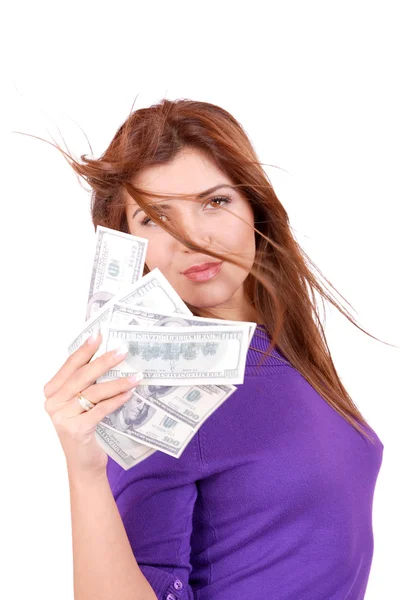 Młoda kobieta trzyma pieniądze w kasie — Zdjęcie stockowe