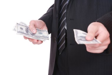 Businessman holding batch of dollars clipart