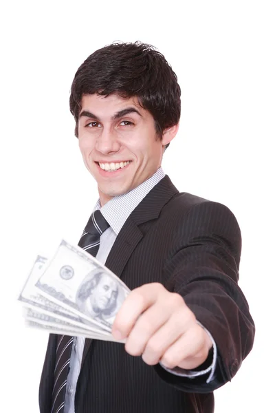 Бизнесмен держит в руках партию долларов — стоковое фото