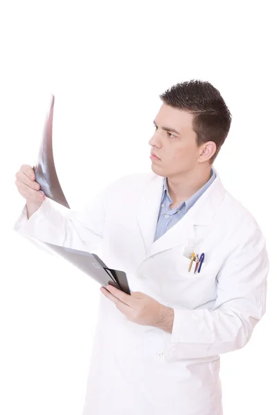 stock image Caucasian mid adult male doctor holding up xrays