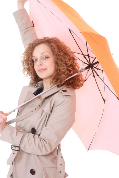 Kvinna som håller i ett paraply — Stockfoto