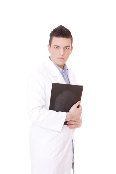 Kaukasiska manlig läkare håller upp xrays — Stockfoto