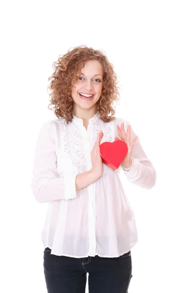 Woman with a heart gift in her hands — Stock Photo, Image
