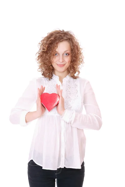 Woman with a heart gift in her hands — Stock Photo, Image