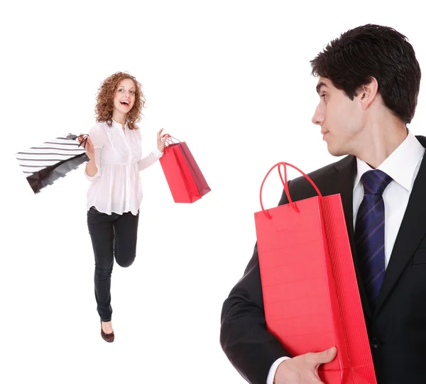 Couple with shopping bags Stock Picture