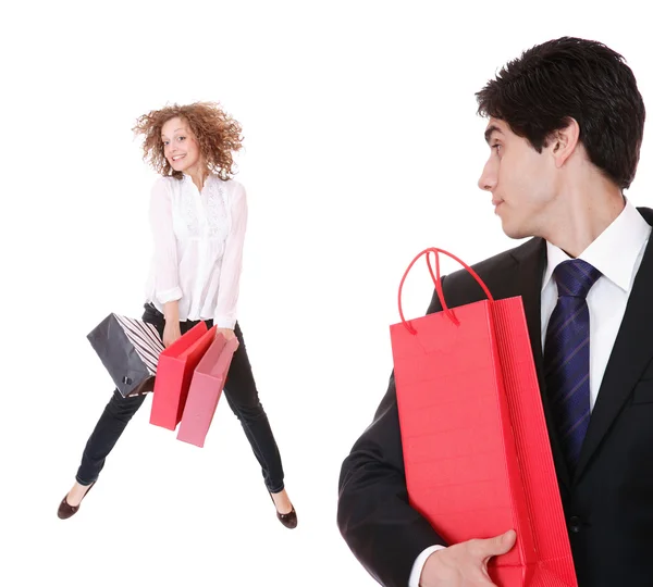 Casal com sacos de compras — Fotografia de Stock