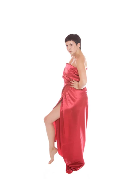 Belle jeune femme en robe longue rouge — Photo