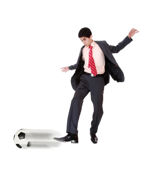 Бизнесмен с футбольным мячом — стоковое фото