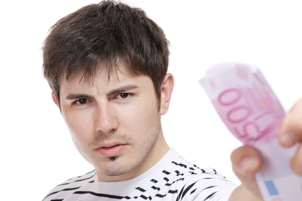 Příležitostné chlap drží euro bankovky — Stock fotografie