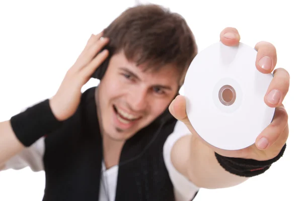 Junger Mann hält eine Compact Disc in der Hand — Stockfoto