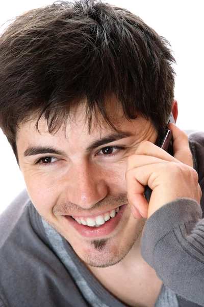 Příležitostné mladík na telefonu — Stock fotografie