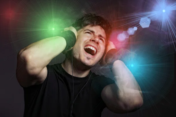 Young Man listening to music Stock Photo