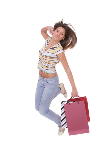 쇼핑백과 점프 하는 여자 — 스톡 사진